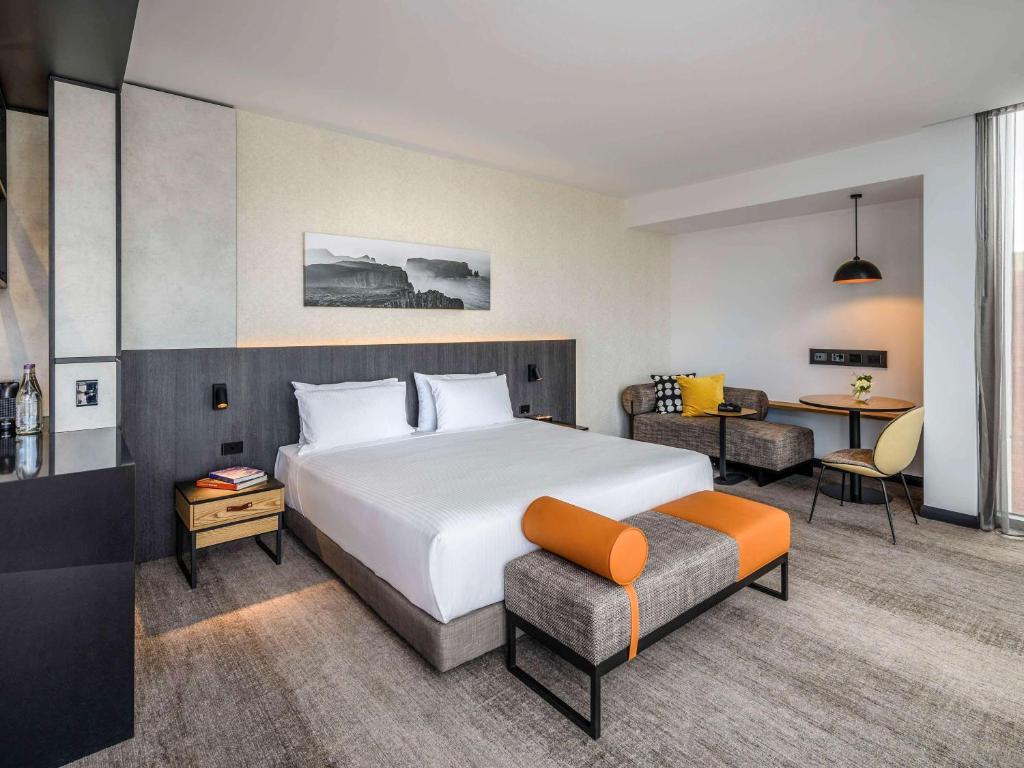 Postel nebo postele na pokoji v ubytování Mövenpick Hotel Hobart