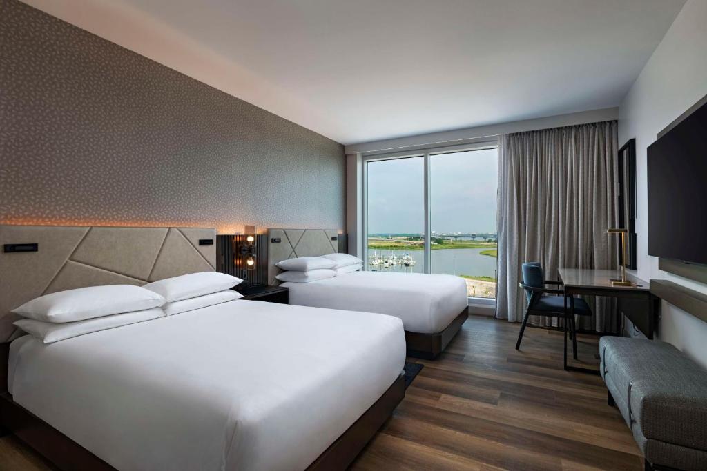 Postel nebo postele na pokoji v ubytování Hyatt Regency Baytown-Houston