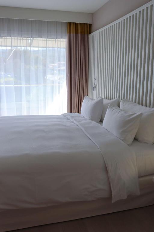 Postel nebo postele na pokoji v ubytování Radisson Blu Resort & Spa, Ajaccio Bay