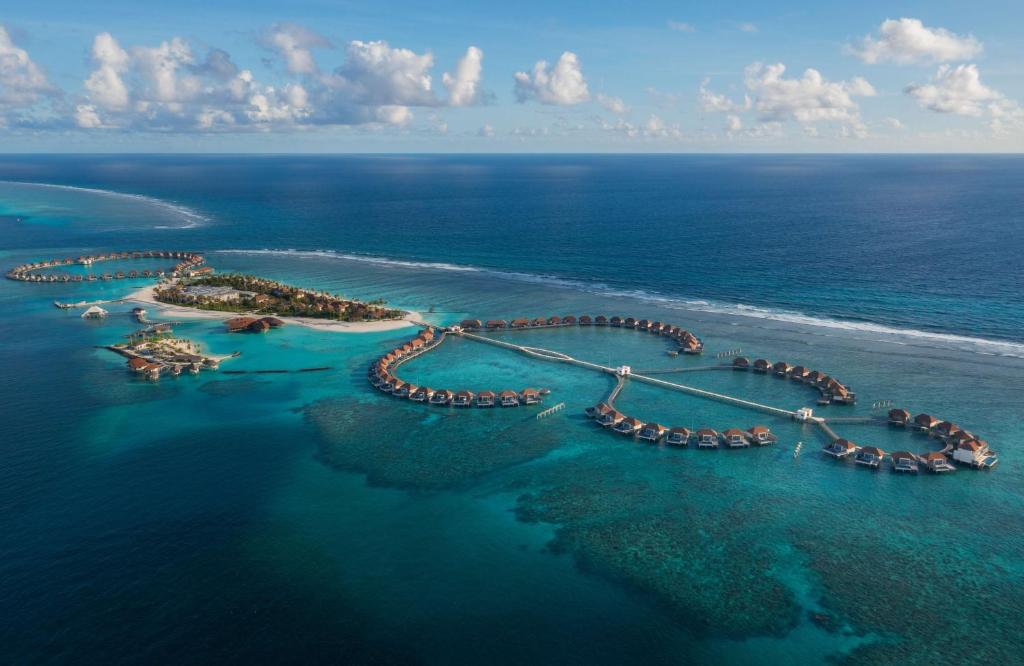 an aerial view of an island in the ocean at Radisson Blu Resort Maldives in Fenfushi