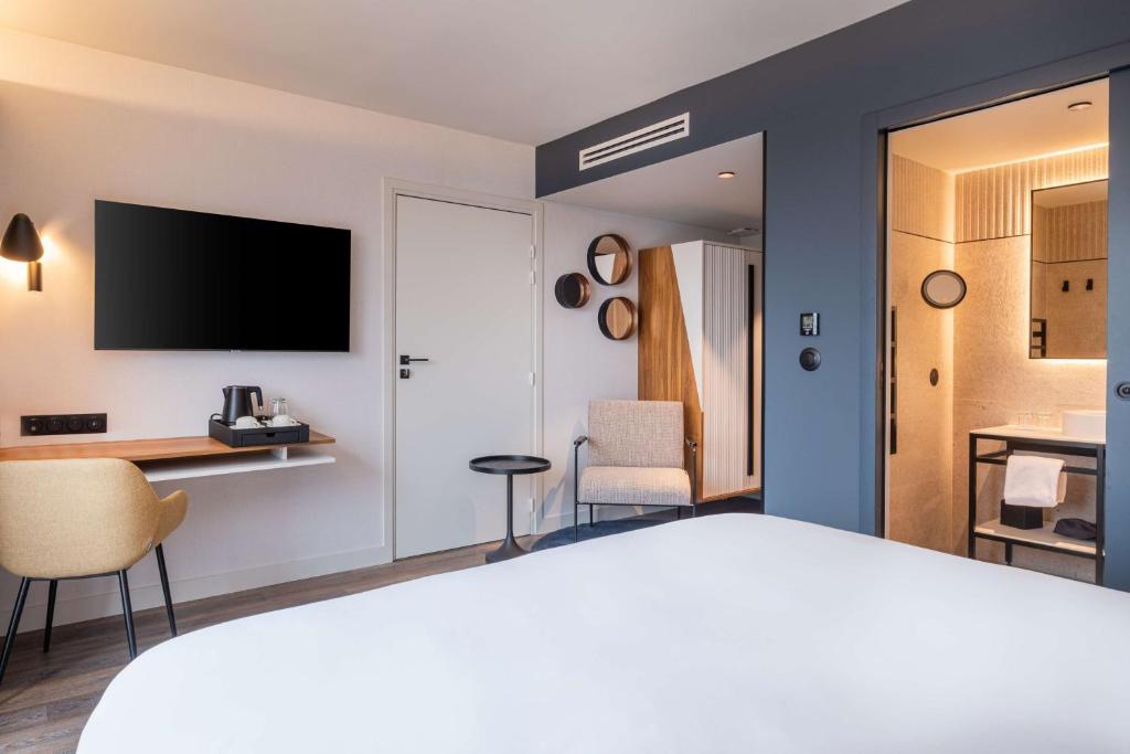 Posteľ alebo postele v izbe v ubytovaní Radisson Blu Grand Hotel & Spa, Malo-Les-Bains