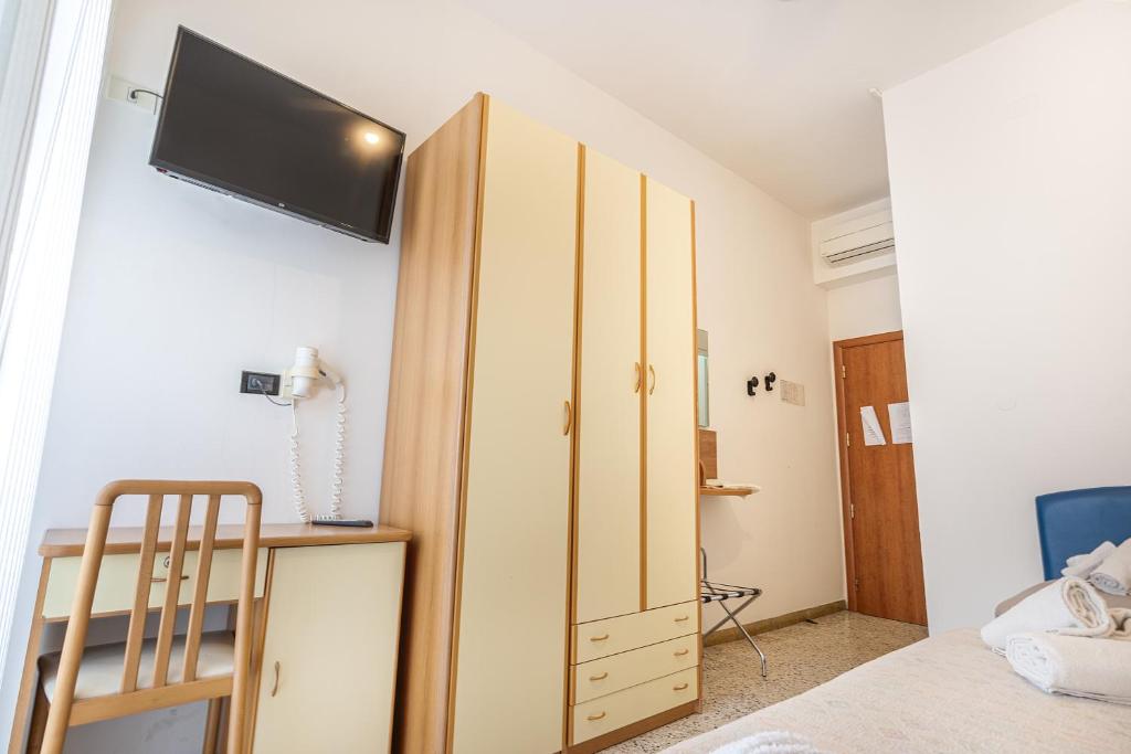 TV a/nebo společenská místnost v ubytování Hotel Lily