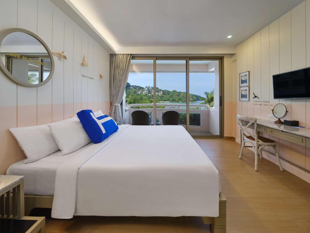 TV a/nebo společenská místnost v ubytování HOMM Bliss Southbeach Patong
