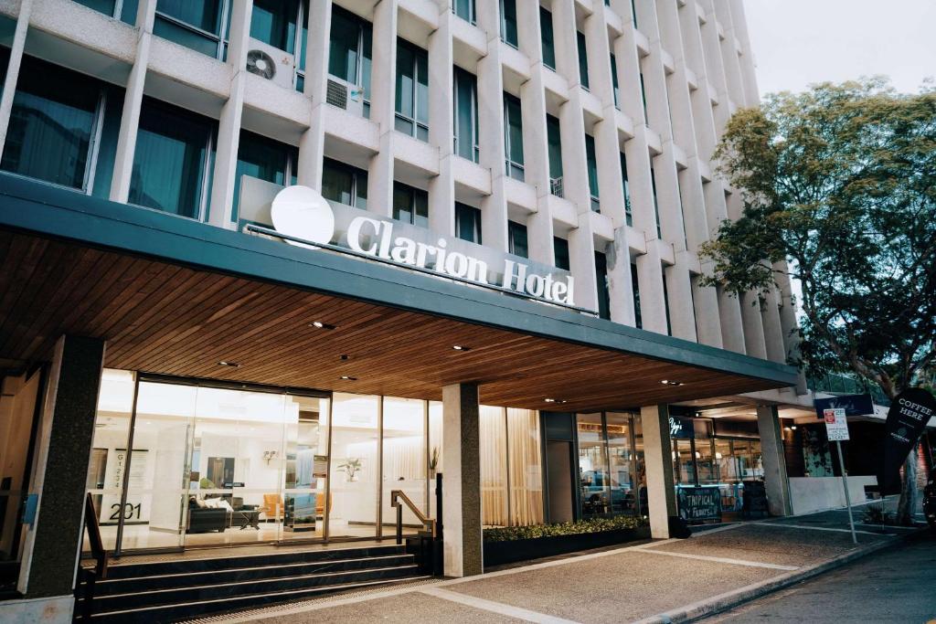 a building with a sign on the front of it at Clarion Hotel Townsville in Townsville