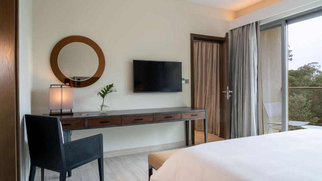 Postel nebo postele na pokoji v ubytování Radisson Blu Hotel & Residence Nairobi Arboretum