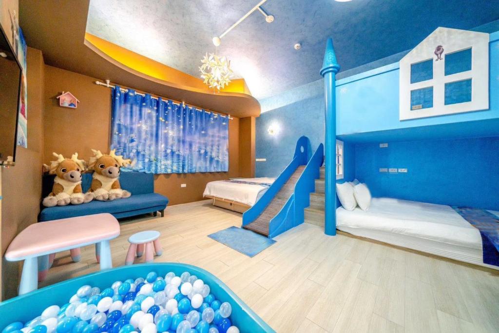 Postel nebo postele na pokoji v ubytování Han Tian B&B