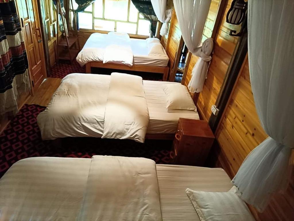 Postel nebo postele na pokoji v ubytování Chô Family