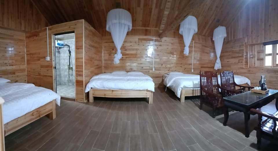 Postel nebo postele na pokoji v ubytování Chô Family