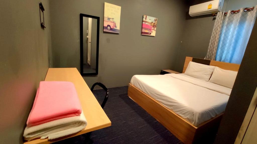 Postel nebo postele na pokoji v ubytování Jurockotel