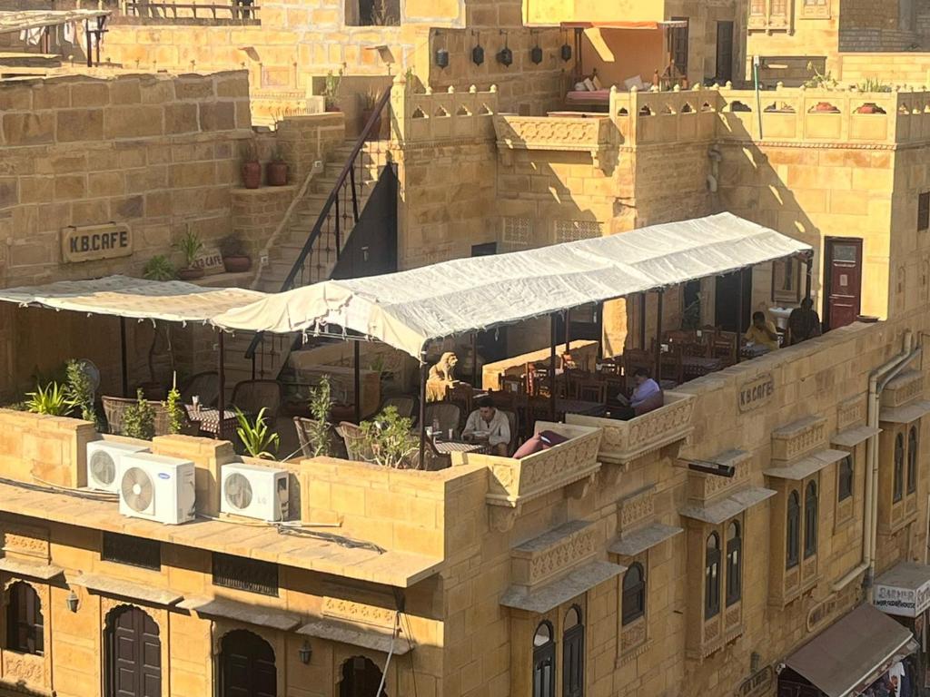 a rooftop of a building with speakers on the roof at Killa Bhawan Lodge in Jaisalmer