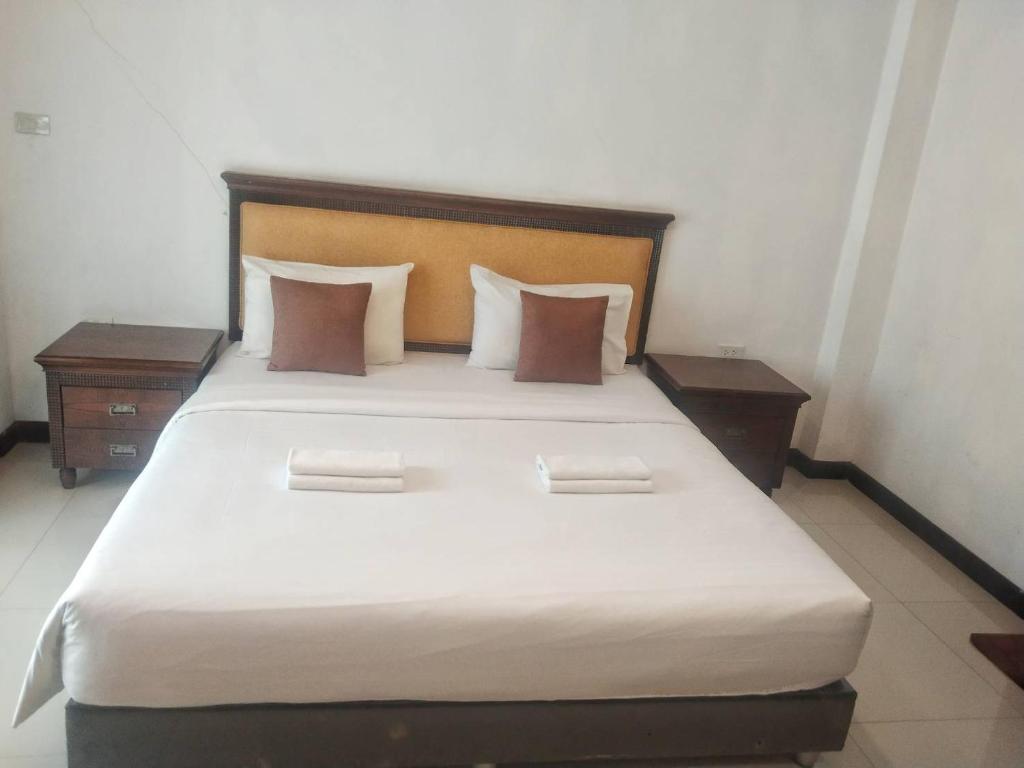 Postel nebo postele na pokoji v ubytování Sota Residence