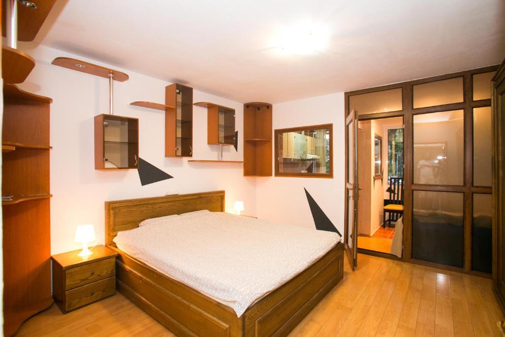 a bedroom with a bed in a room at Residence 30 in Bucharest