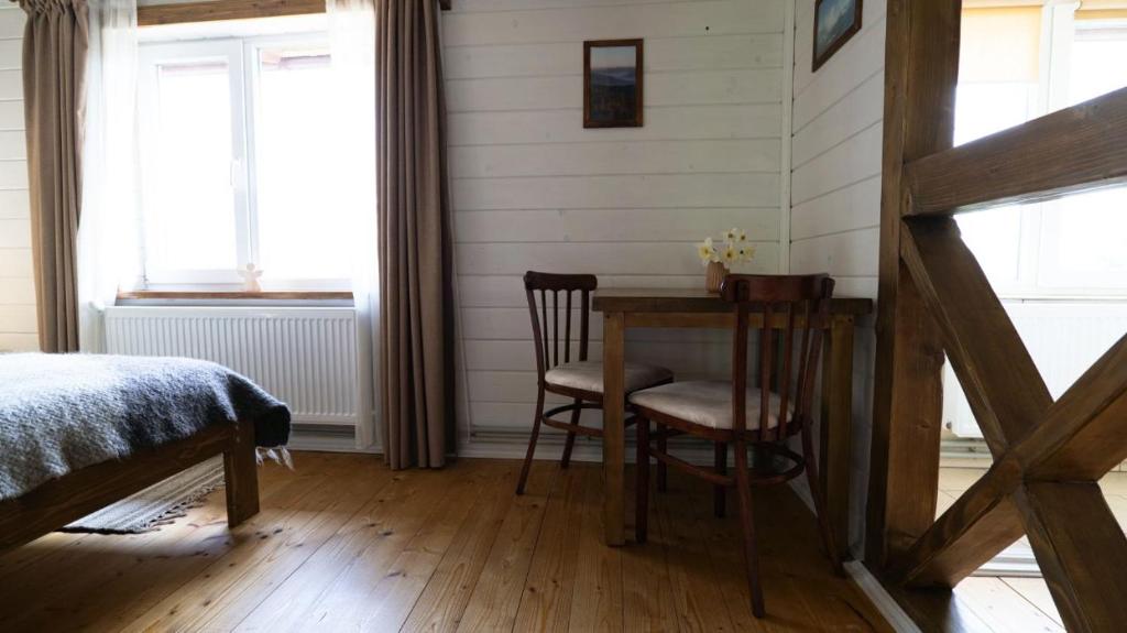 Postel nebo postele na pokoji v ubytování Krokus house