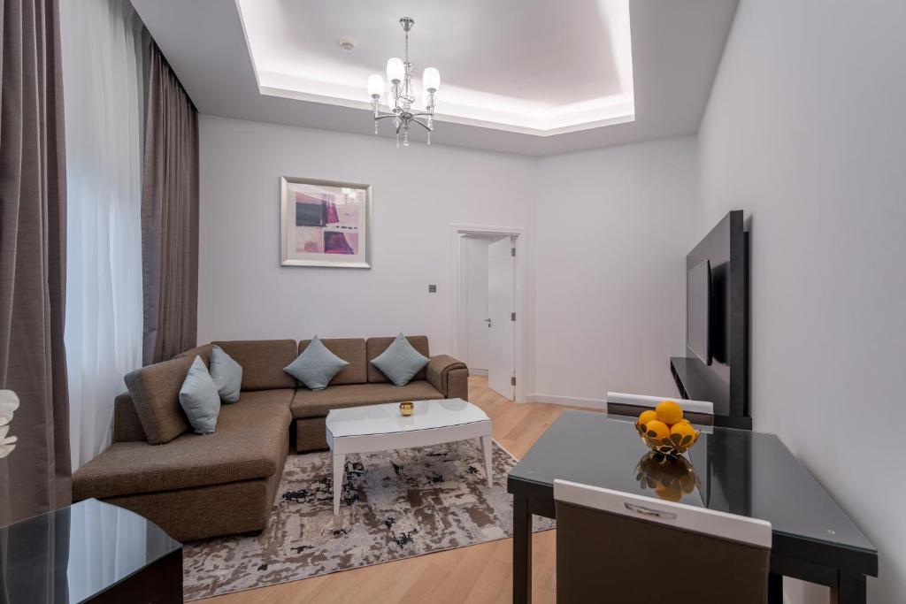 Телевизор и/или развлекательный центр в Rose Garden Hotel Apartments - Al Barsha, Near Metro Station