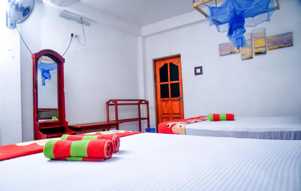 Postel nebo postele na pokoji v ubytování Eco Diamond Palace