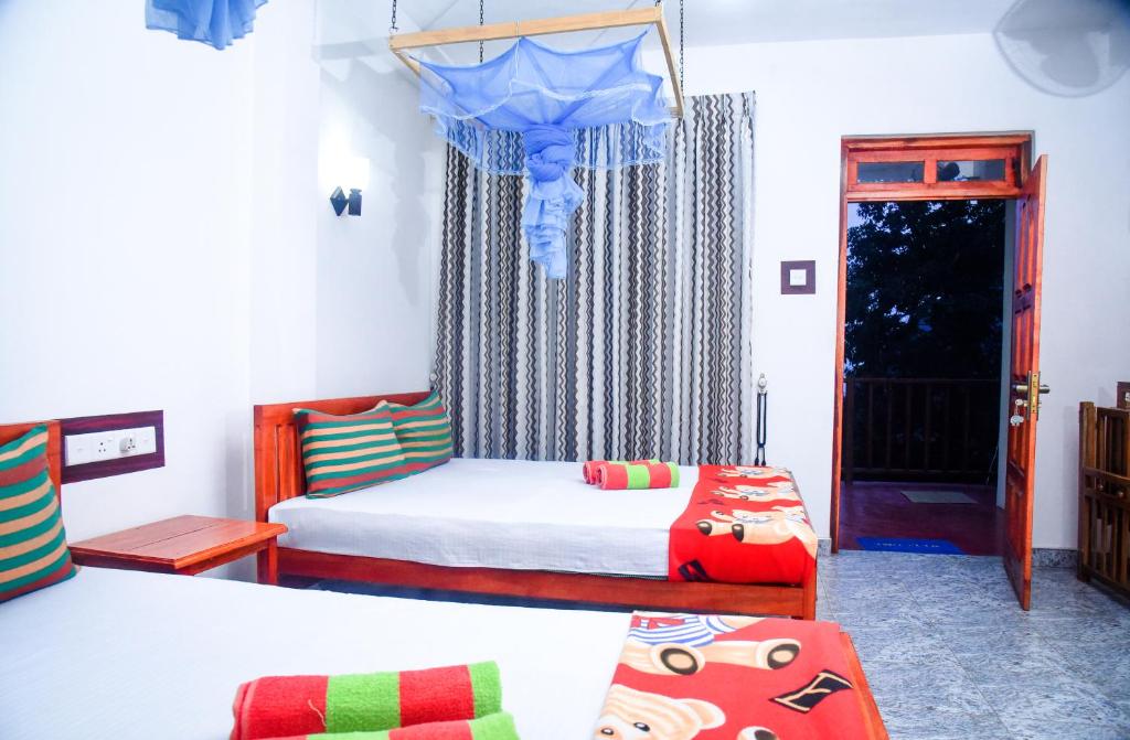 Postel nebo postele na pokoji v ubytování Eco Diamond Palace