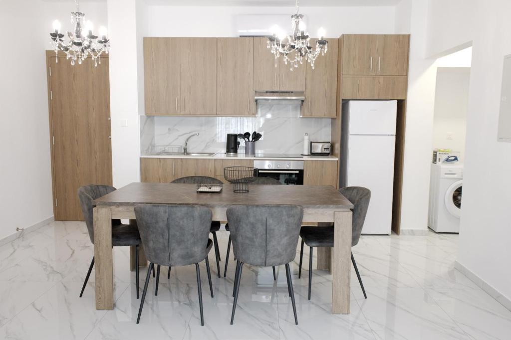 Η κουζίνα ή μικρή κουζίνα στο Musan Boutique Apartments