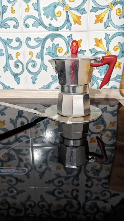 Příslušenství pro přípravu čaje a kávy v ubytování Apple Lemonade B&B