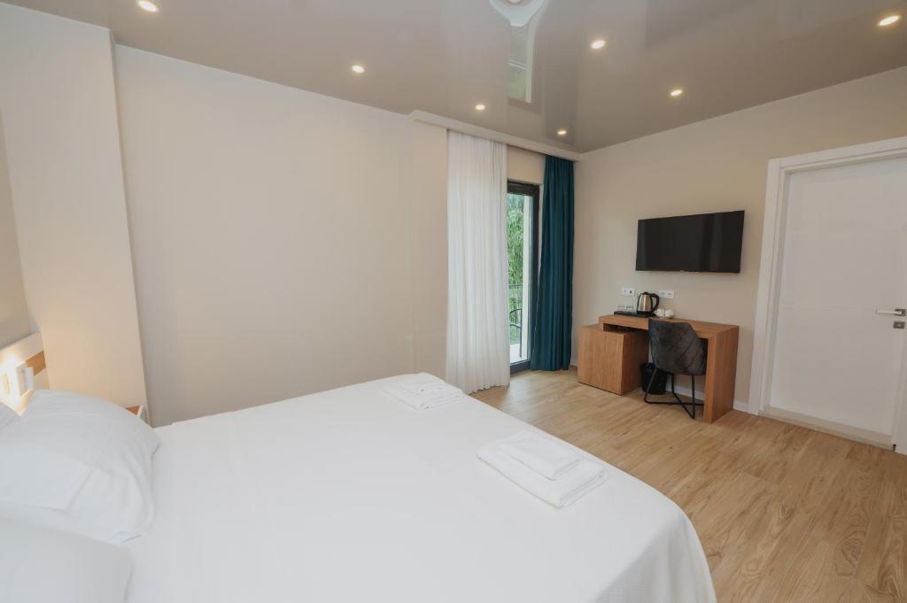 Voodi või voodid majutusasutuse Ritsa Resort toas