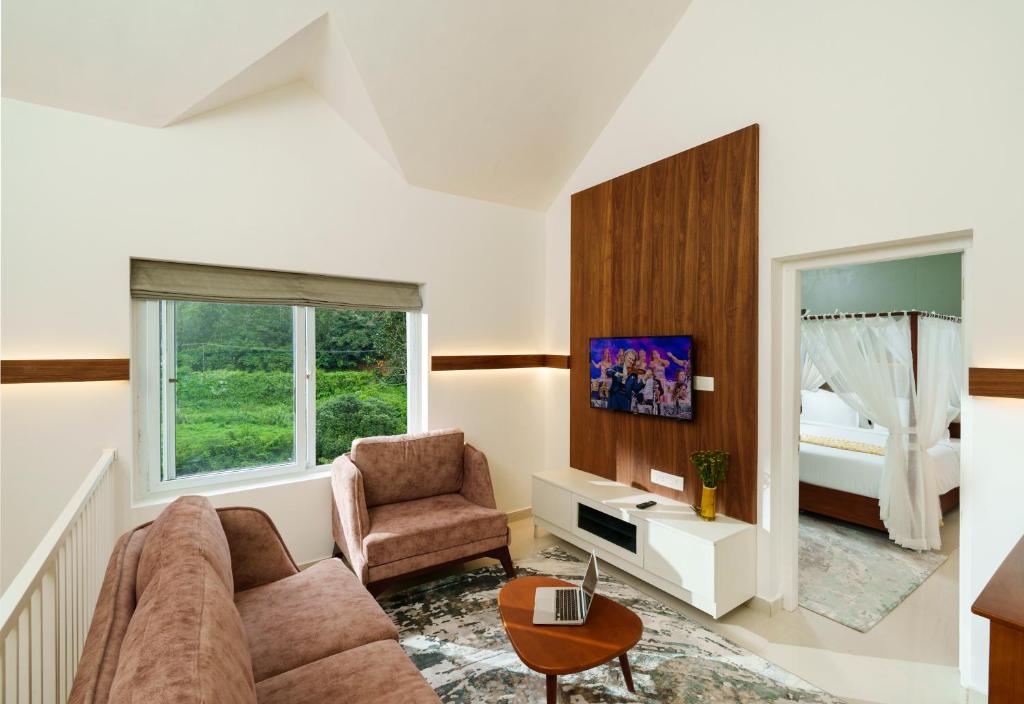 TV a/nebo společenská místnost v ubytování Eden Woods Resorts and Spa