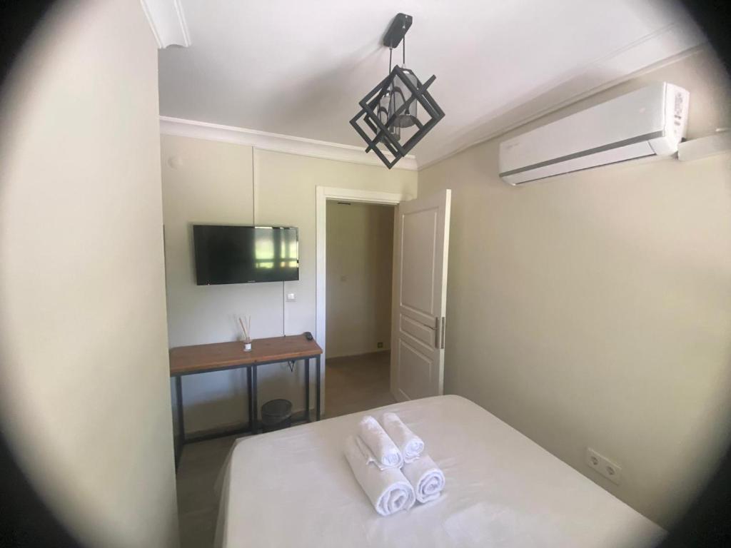Ein Bett oder Betten in einem Zimmer der Unterkunft Zu Tiny House Hotel & Restaurant