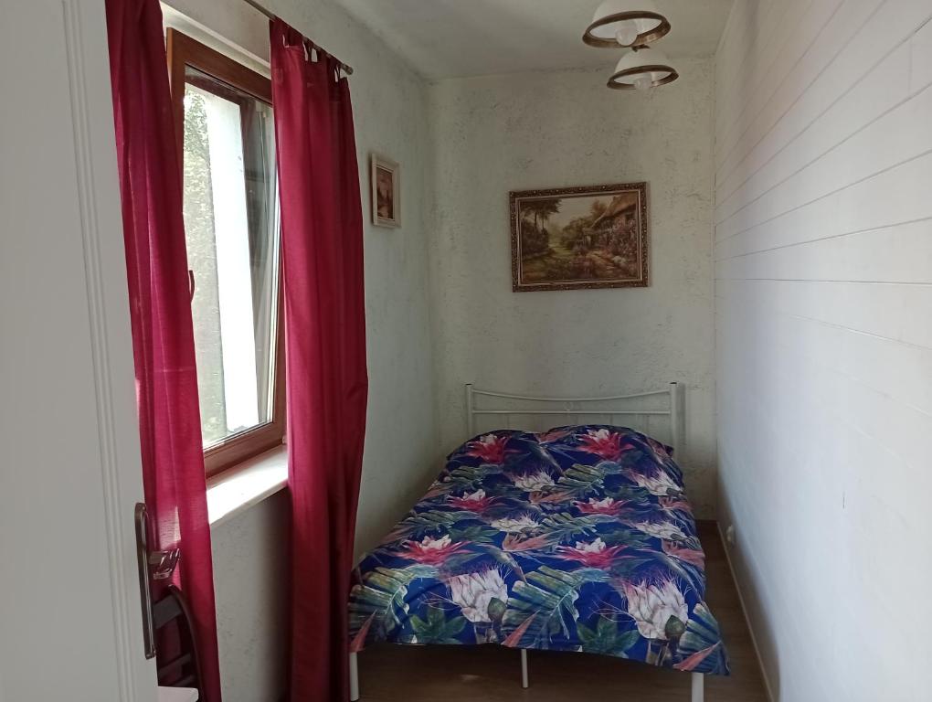 Postel nebo postele na pokoji v ubytování Domki nad Jeziorem