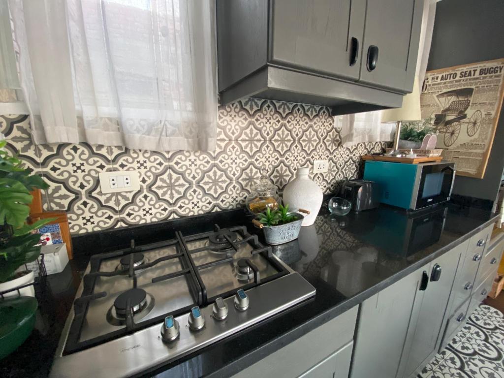 A kitchen or kitchenette at La Perle Pyramids