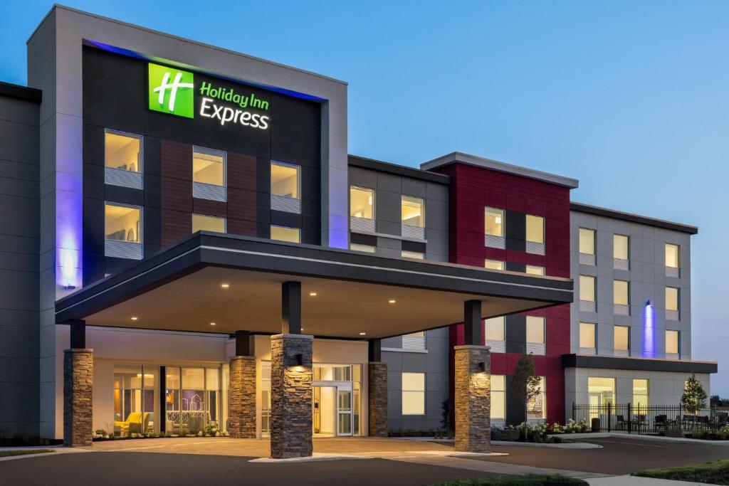 an office building with the hospitaleyes sign on it at Holiday Inn Express - Strathroy, an IHG Hotel in Strathroy