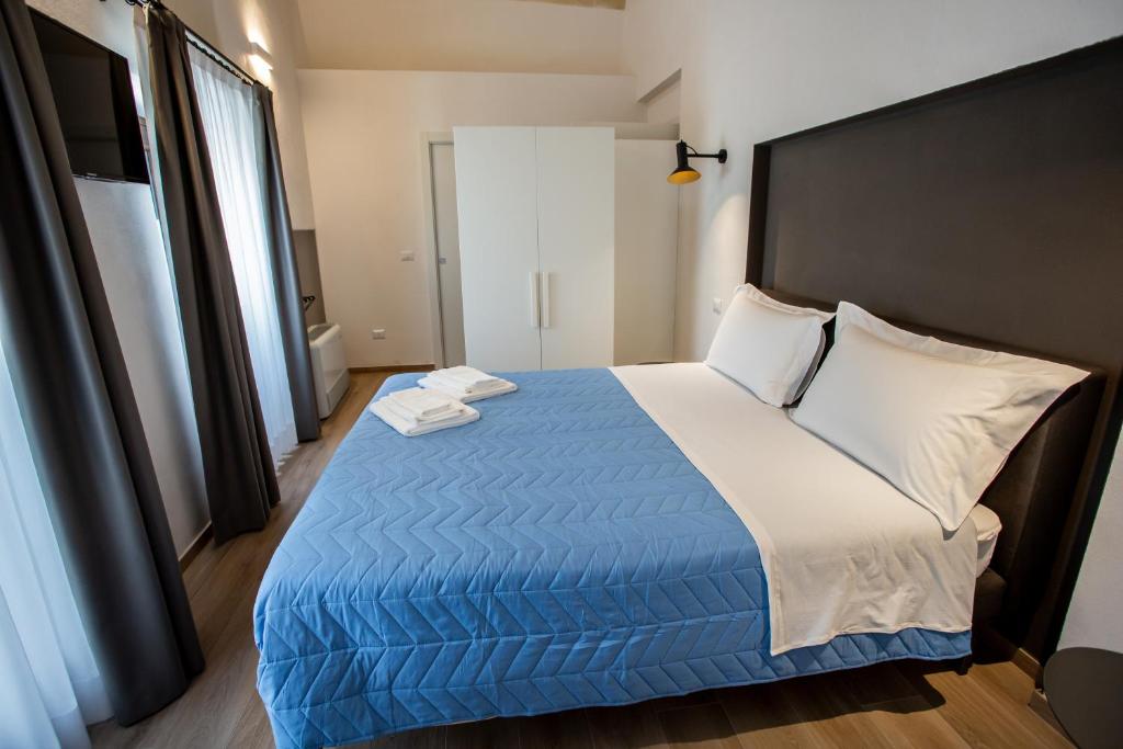 Postel nebo postele na pokoji v ubytování Casa Nera GuestHouse