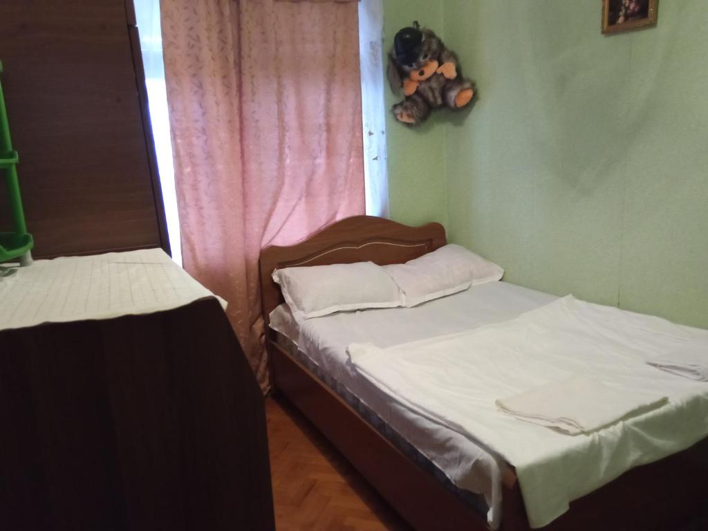 En eller flere senge i et værelse på Apart hotel Nikia