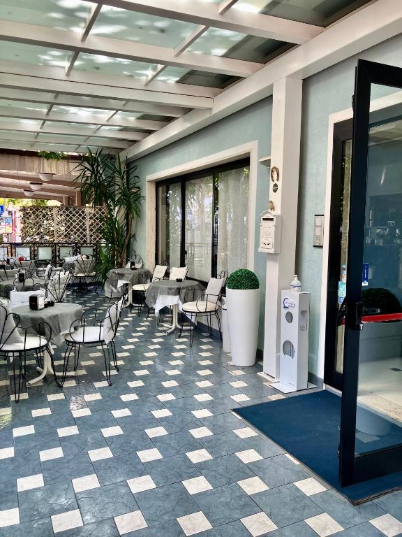 Posezení v ubytování Hotel Ginevra e Residence