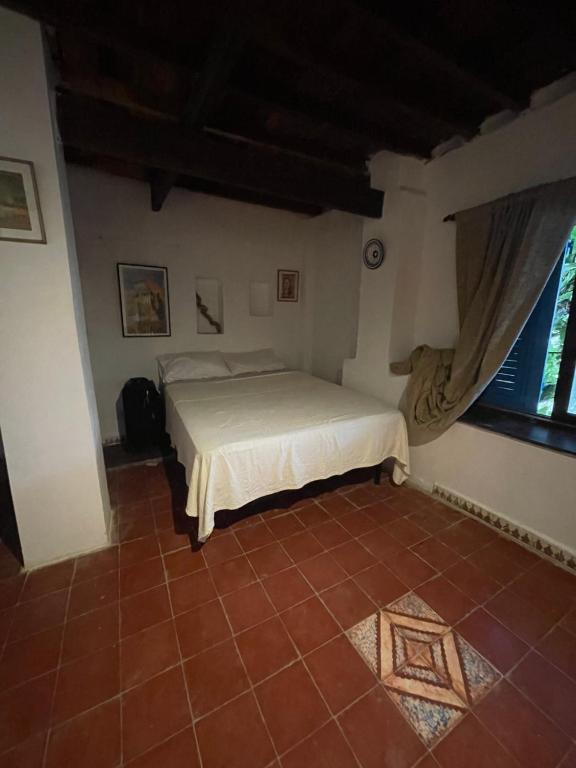 Postel nebo postele na pokoji v ubytování Dar El Pirata Hostel