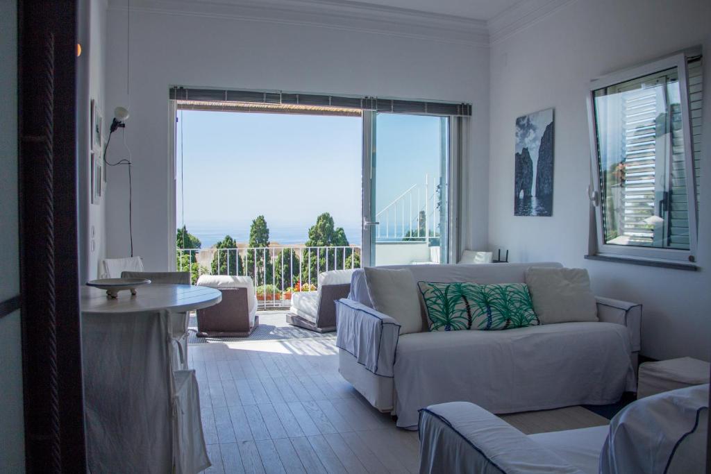 Posezení v ubytování Attico Capri