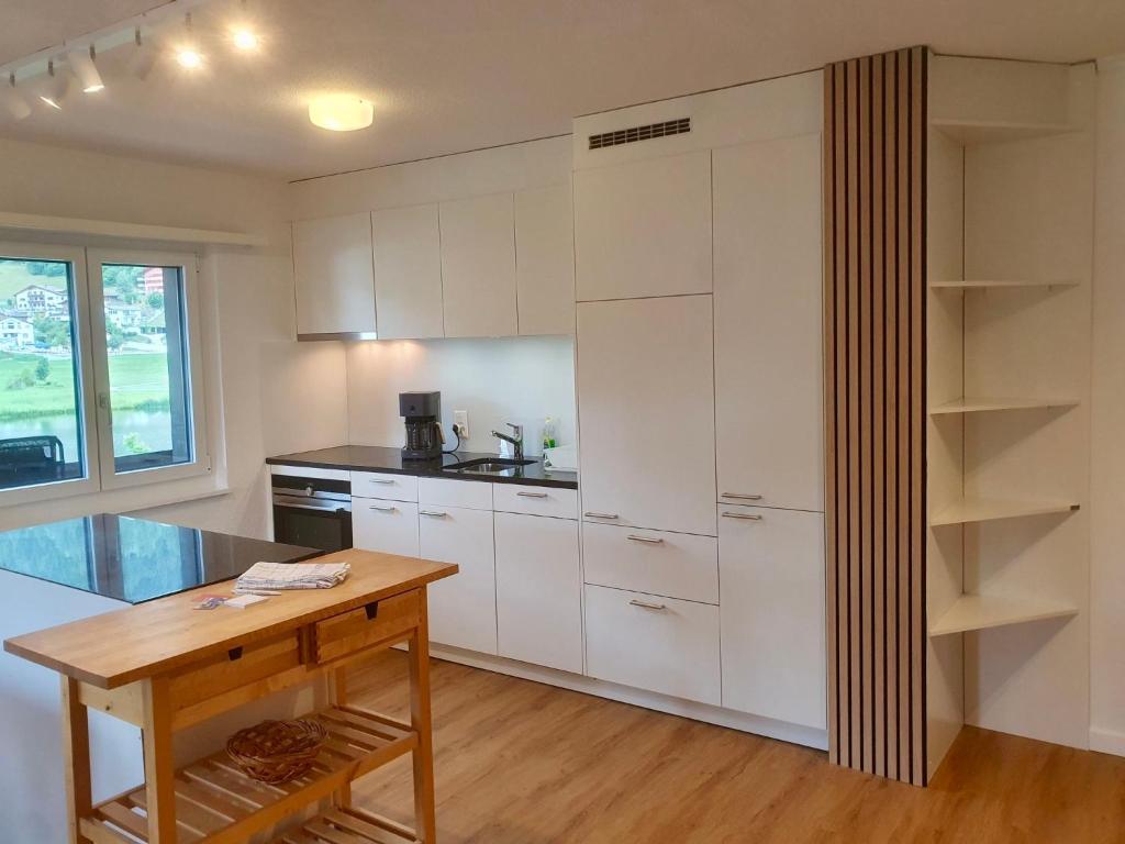 Kuchyň nebo kuchyňský kout v ubytování Apartment Apt- 13 by Interhome