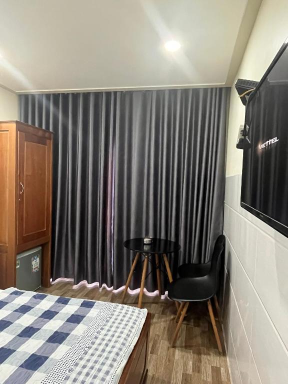 Postel nebo postele na pokoji v ubytování Căn hộ Tường Mơ (An Tâm Hotel)