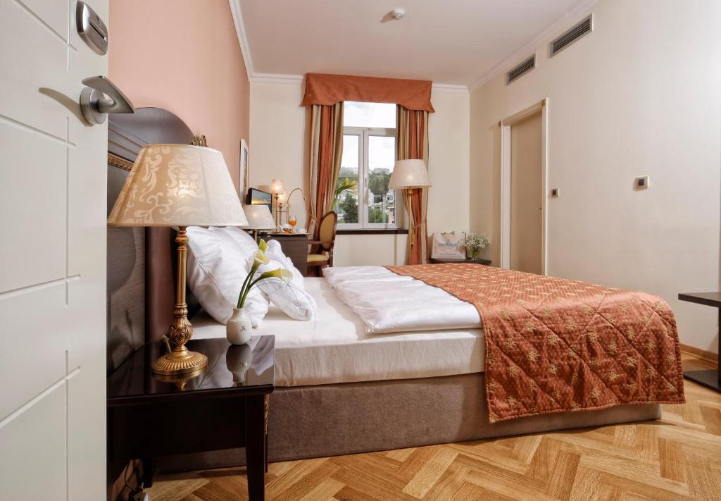 Krevet ili kreveti u jedinici u okviru objekta Hotel Kvarner Palace