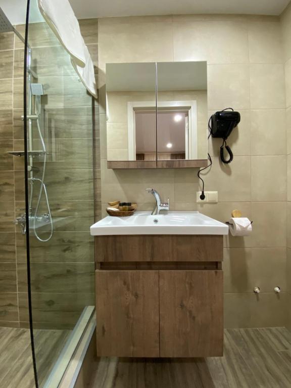 Koupelna v ubytování Kera Rooms