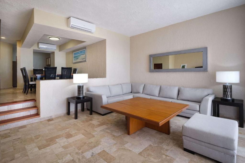 Posezení v ubytování Wyndham Grand Cancun All Inclusive Resort & Villas