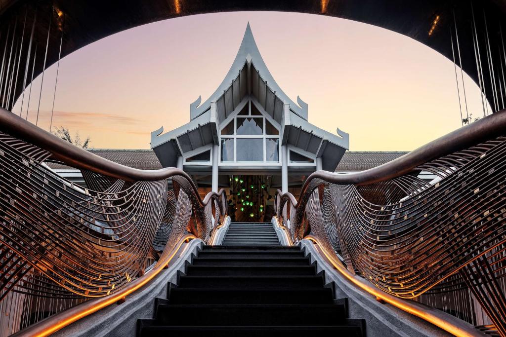 a set of stairs leading to a building at Banyan Tree Krabi in Tab Kaek Beach