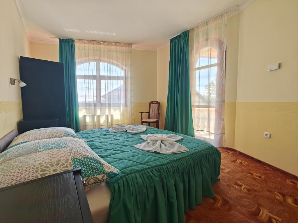 Postel nebo postele na pokoji v ubytování Villa Lira