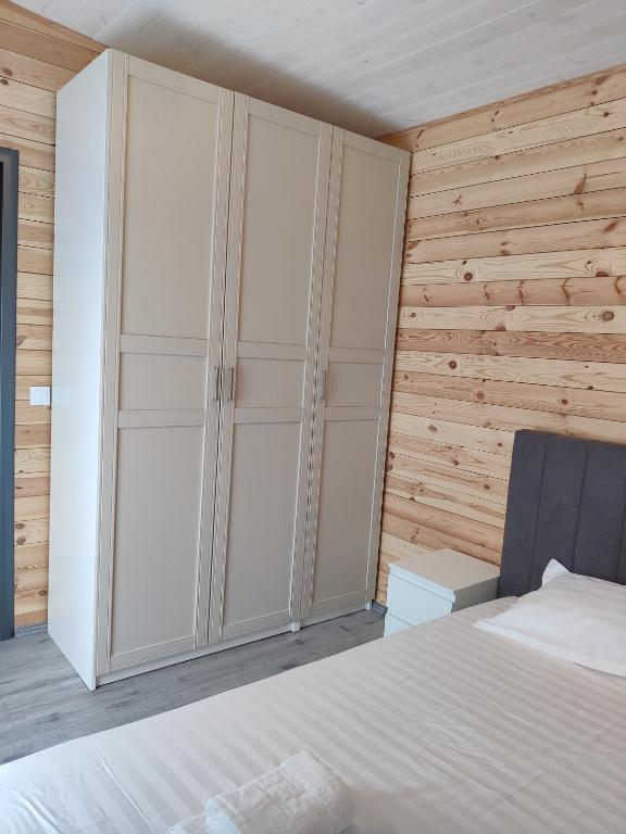 Postel nebo postele na pokoji v ubytování Kub Baile Govora
