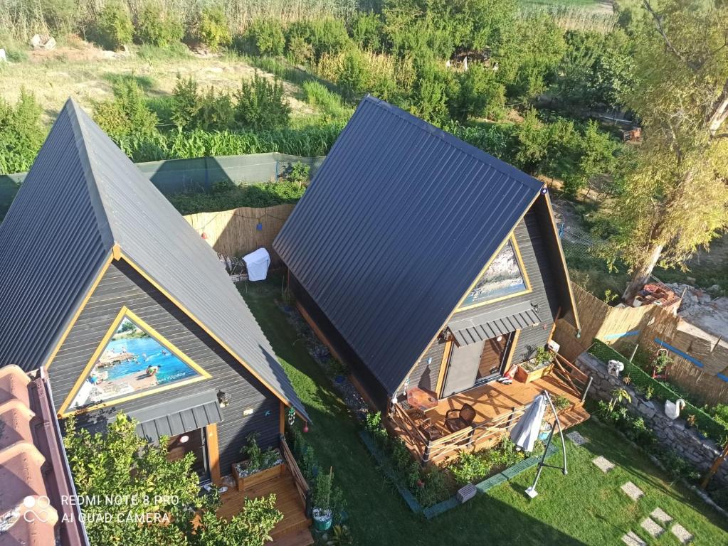 an overhead view of a house with a swimming pool at El-Ya Bungalov ve pansiyon in Dalaman