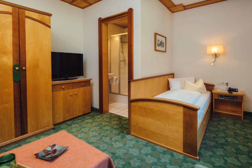 TV a/nebo společenská místnost v ubytování Huber Hotel Tramserhof
