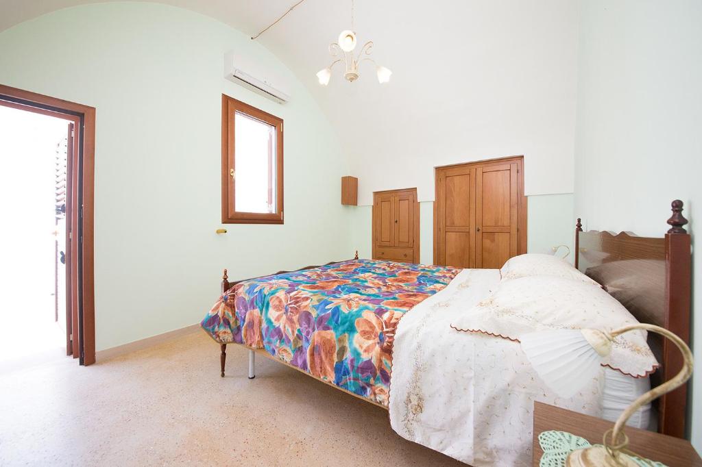 Postel nebo postele na pokoji v ubytování Casa Lucia