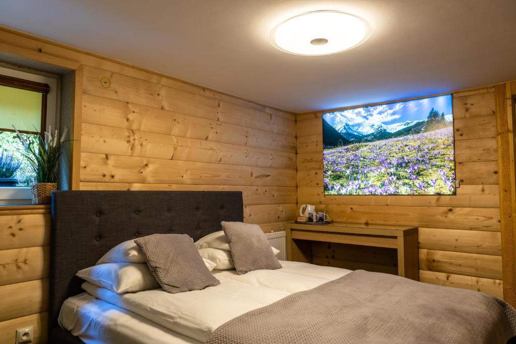 Posteľ alebo postele v izbe v ubytovaní APLIT GUEST HOUSE