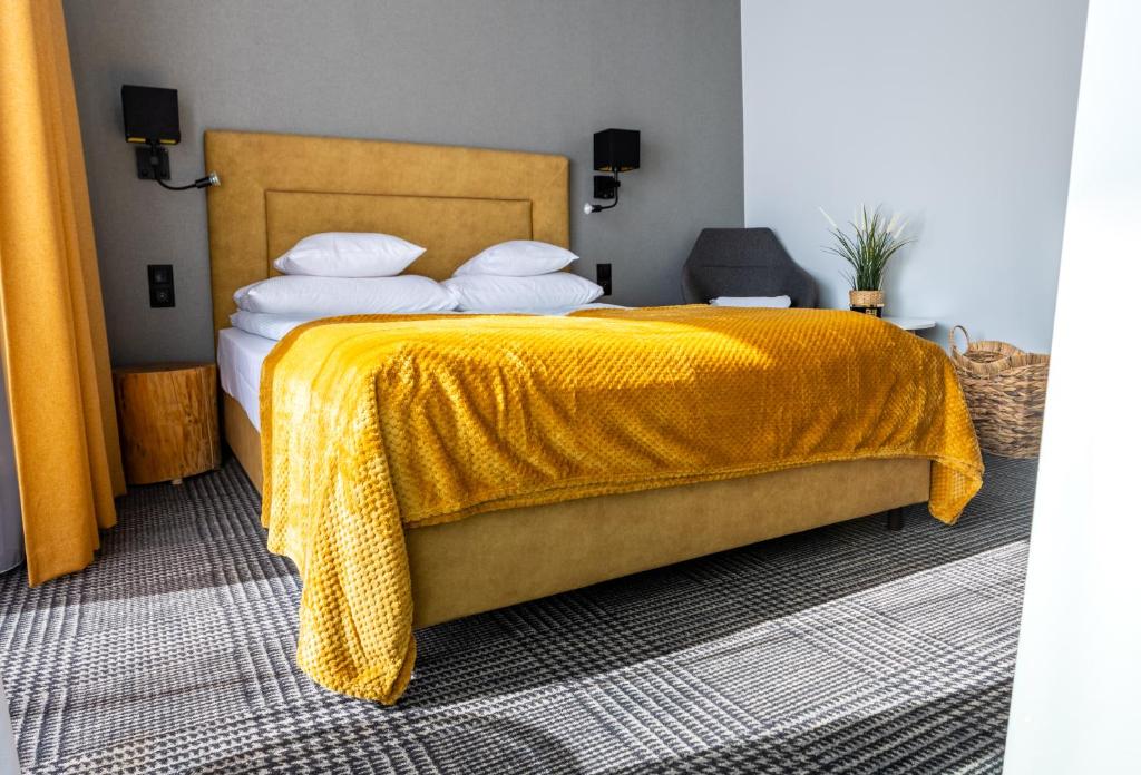 Posteľ alebo postele v izbe v ubytovaní APLIT GUEST HOUSE