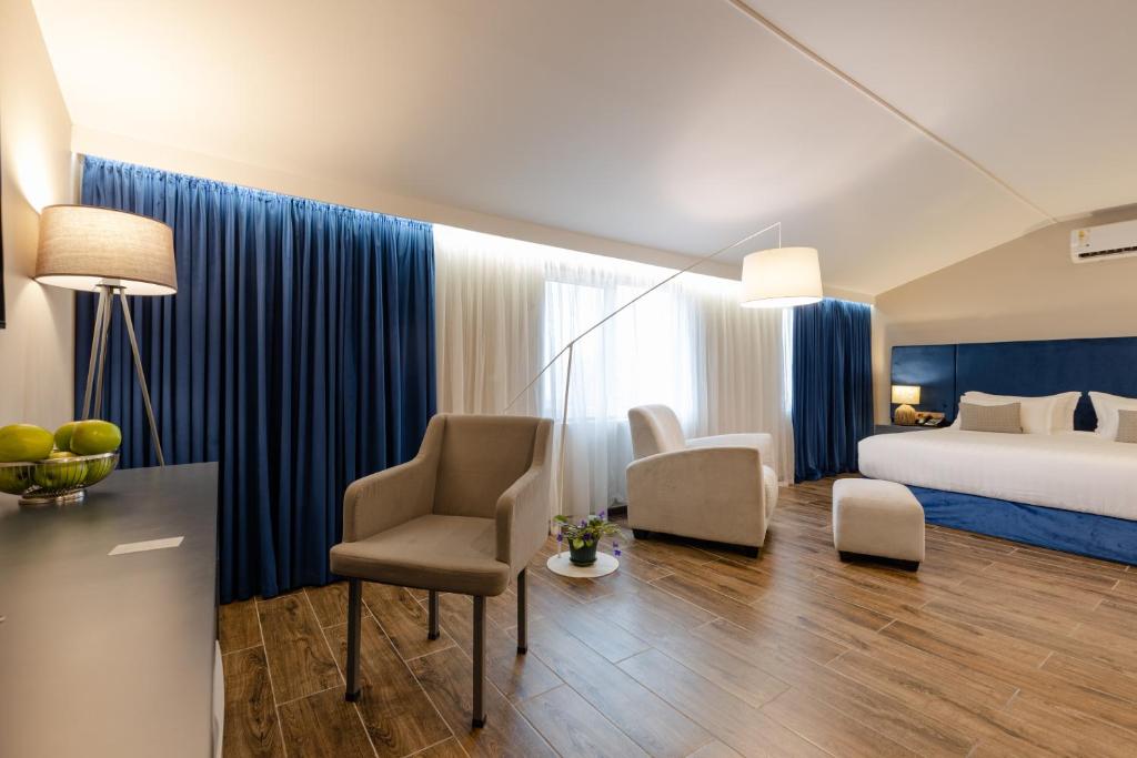 Postel nebo postele na pokoji v ubytování Hotel Aisi