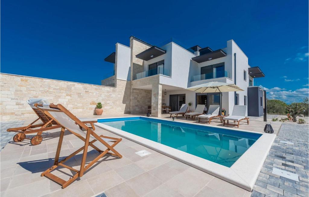 an image of a villa with a swimming pool at Villa Oasis in Sukošan