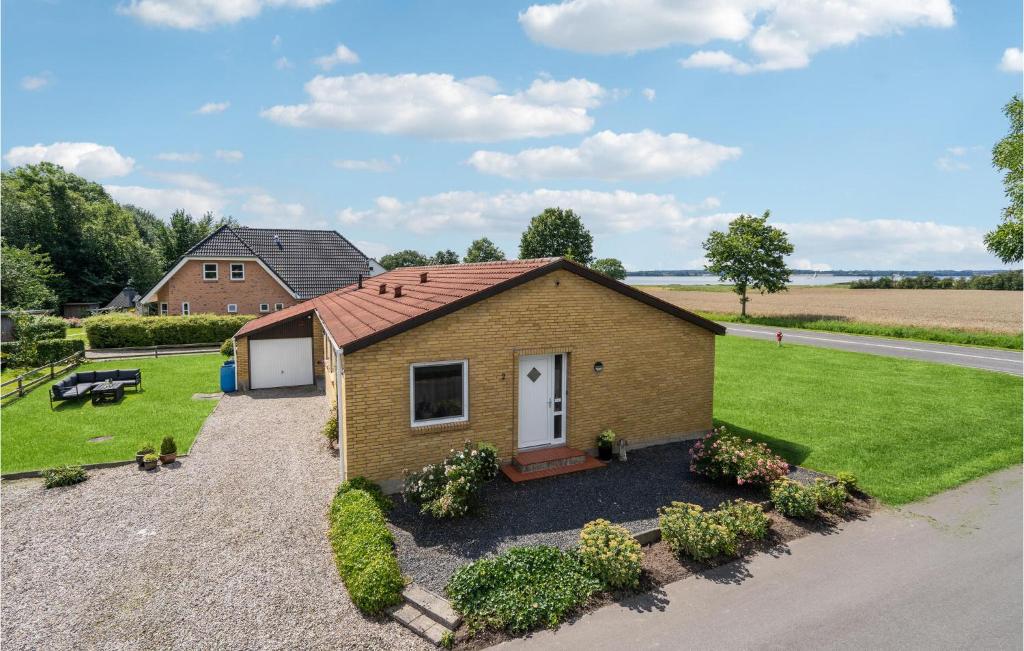 a tiny house in the middle of a field at Lovely Home In Nordborg With Wifi in Nordborg