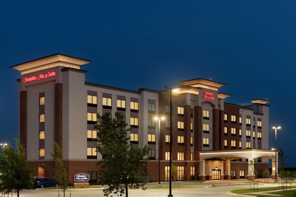 a rendering of a hotel at night at Hampton Inn & Suites Norman-Conference Center Area, Ok in Norman